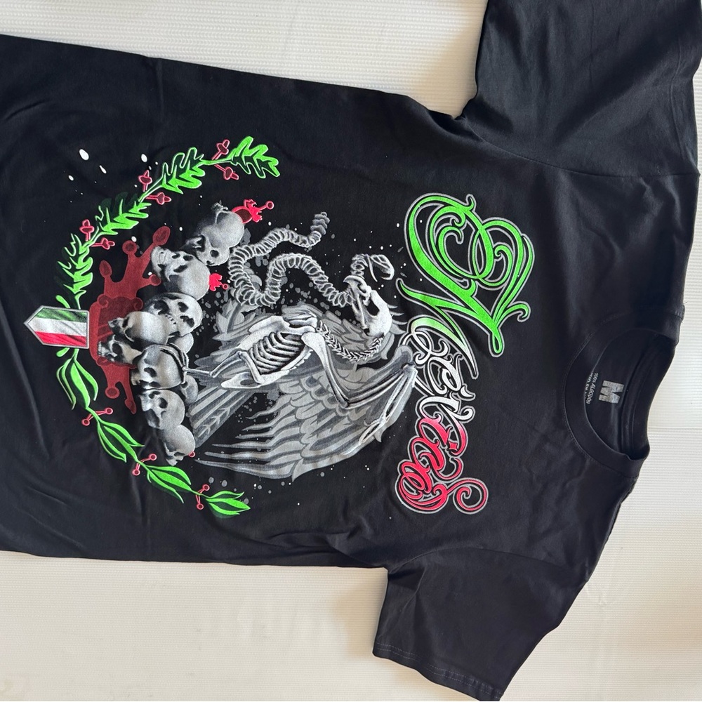Black Graphic Tee with Skull and Wing Design